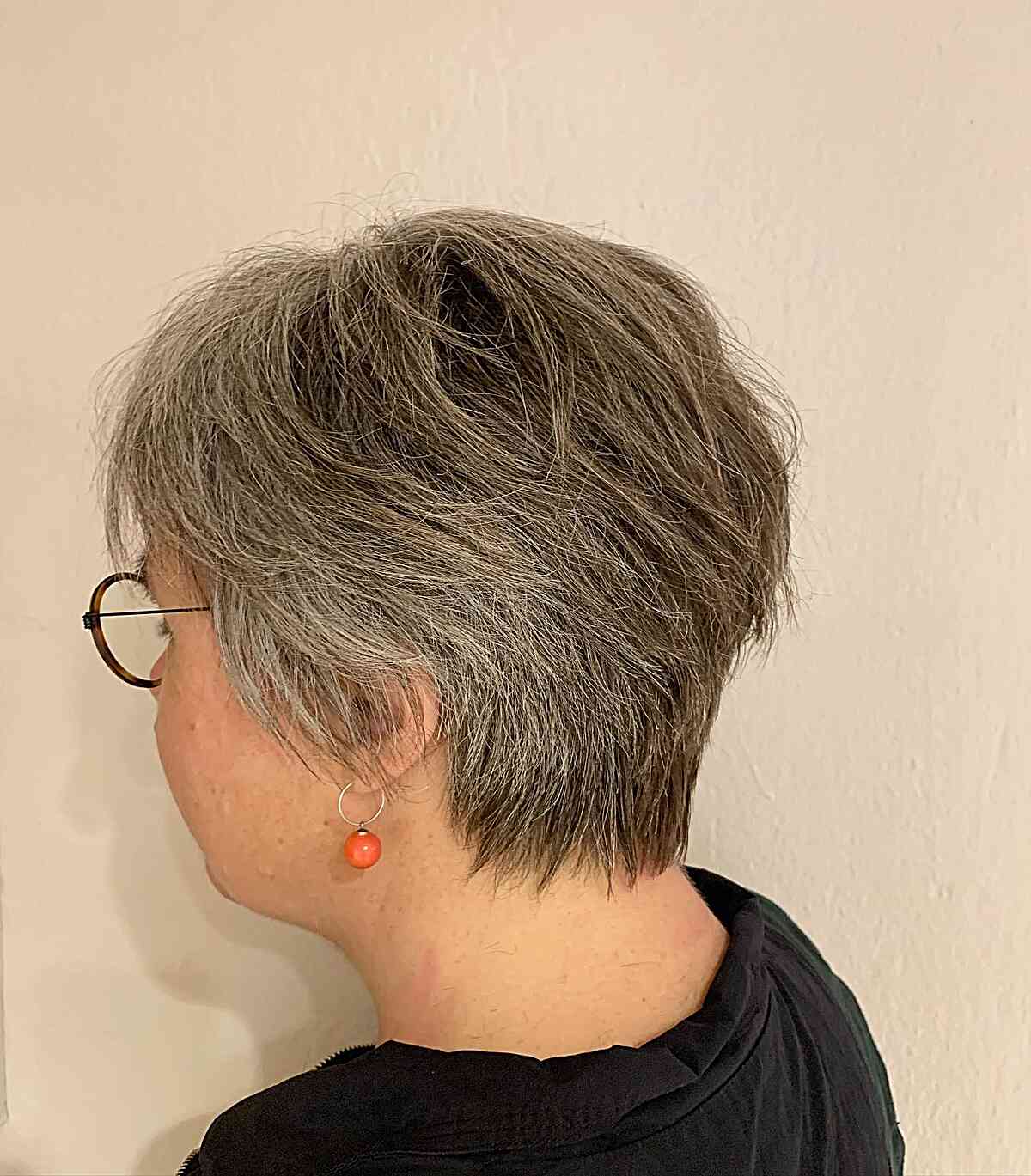 An effortless tapered pixie cut for women over 60 with thick hair