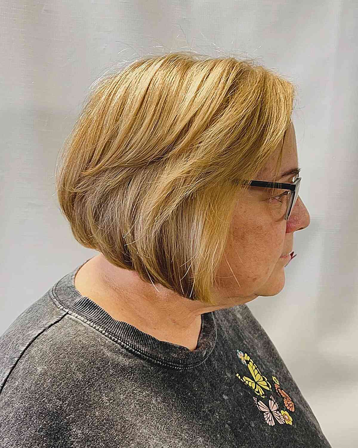 Light blonde ombre chin length bob for 60 year olds with thick hair