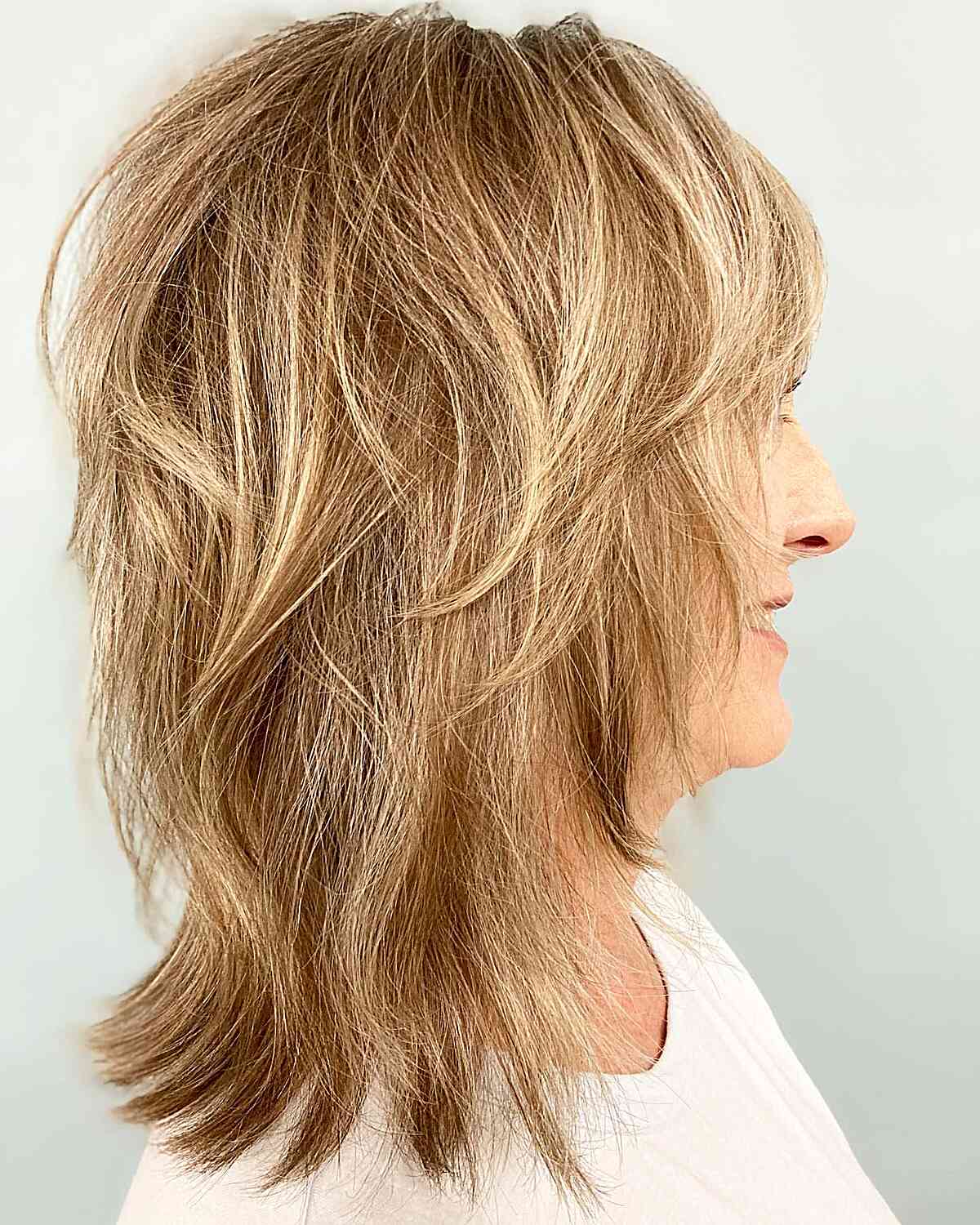 Golden Blonde Mid-Length Shag for Senior Women Over Sixty