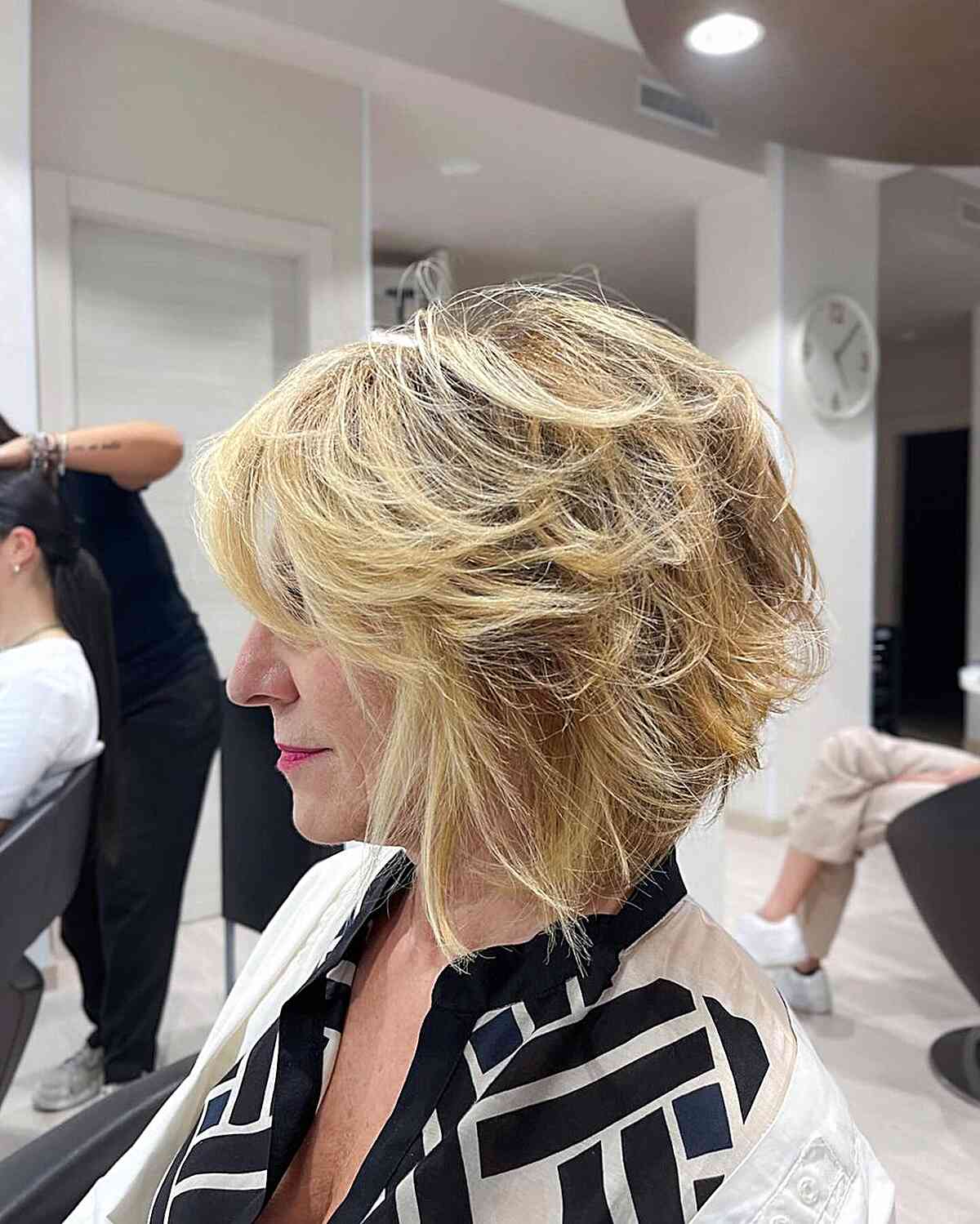 A-Line Feathered Shaggy Bob with Shorter Layers for Older Women Over 60