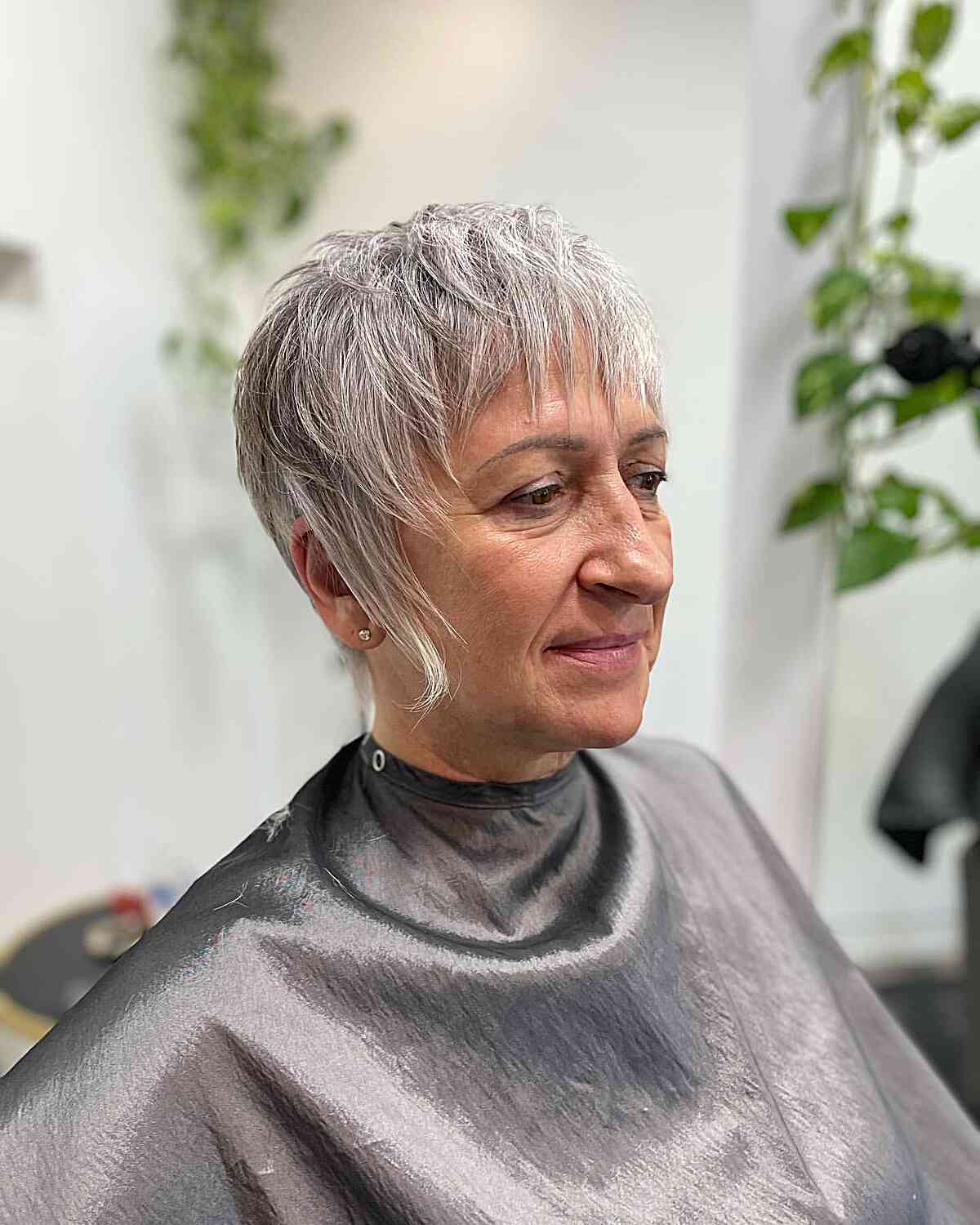 Super Short Razored Shaggy Pixie Cut with Piece-y Bangs for ladies in their 60s