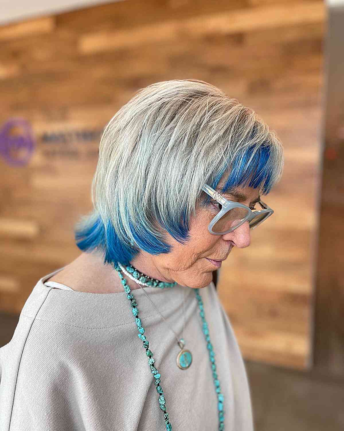 Straight Silver Pixie Shag with Vivid Blue Underlights for Seniors Aged 60 with Specs