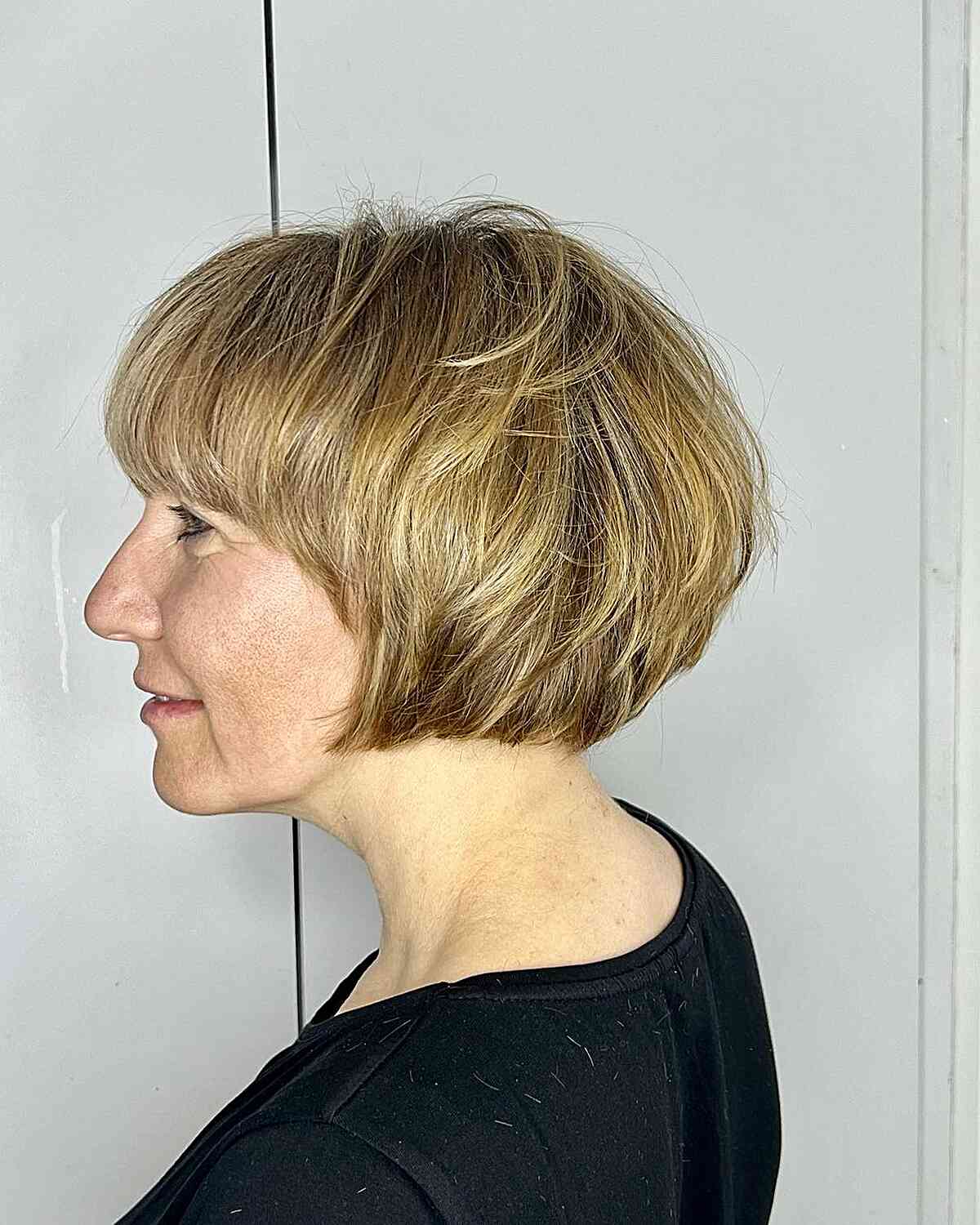 Soft, messy, jaw-dropping blonde French bob for women over 60