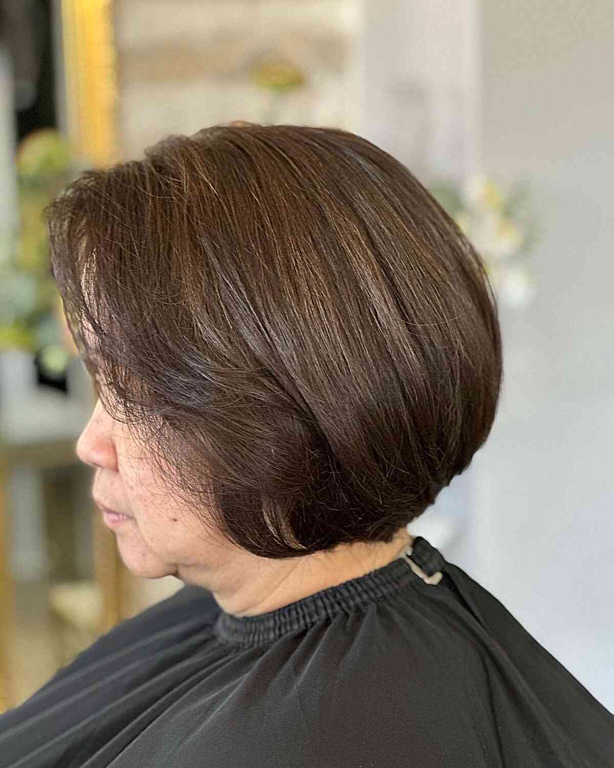 Low maintenance, jaw length brown inverted bob for women 60+