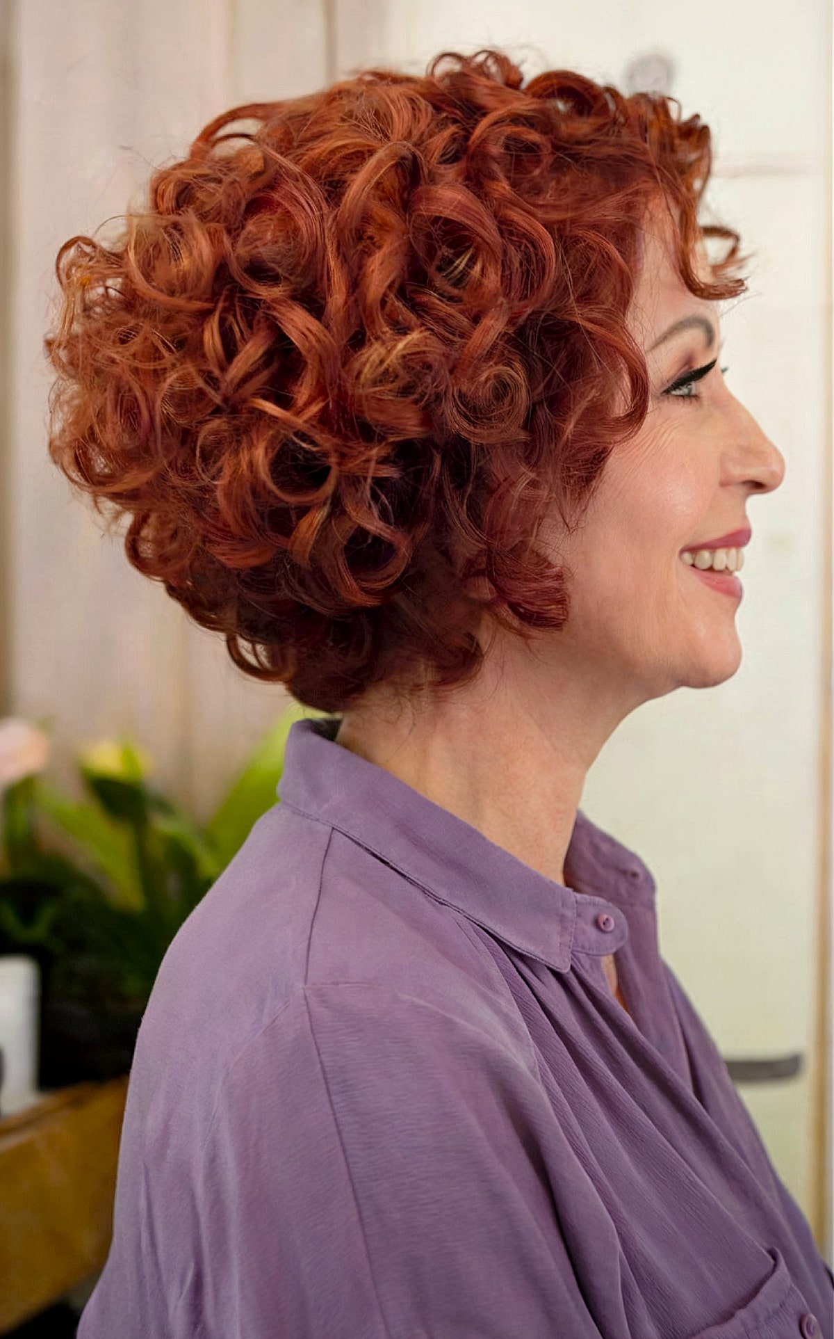 Angled bob for curly hair for women in their 60s