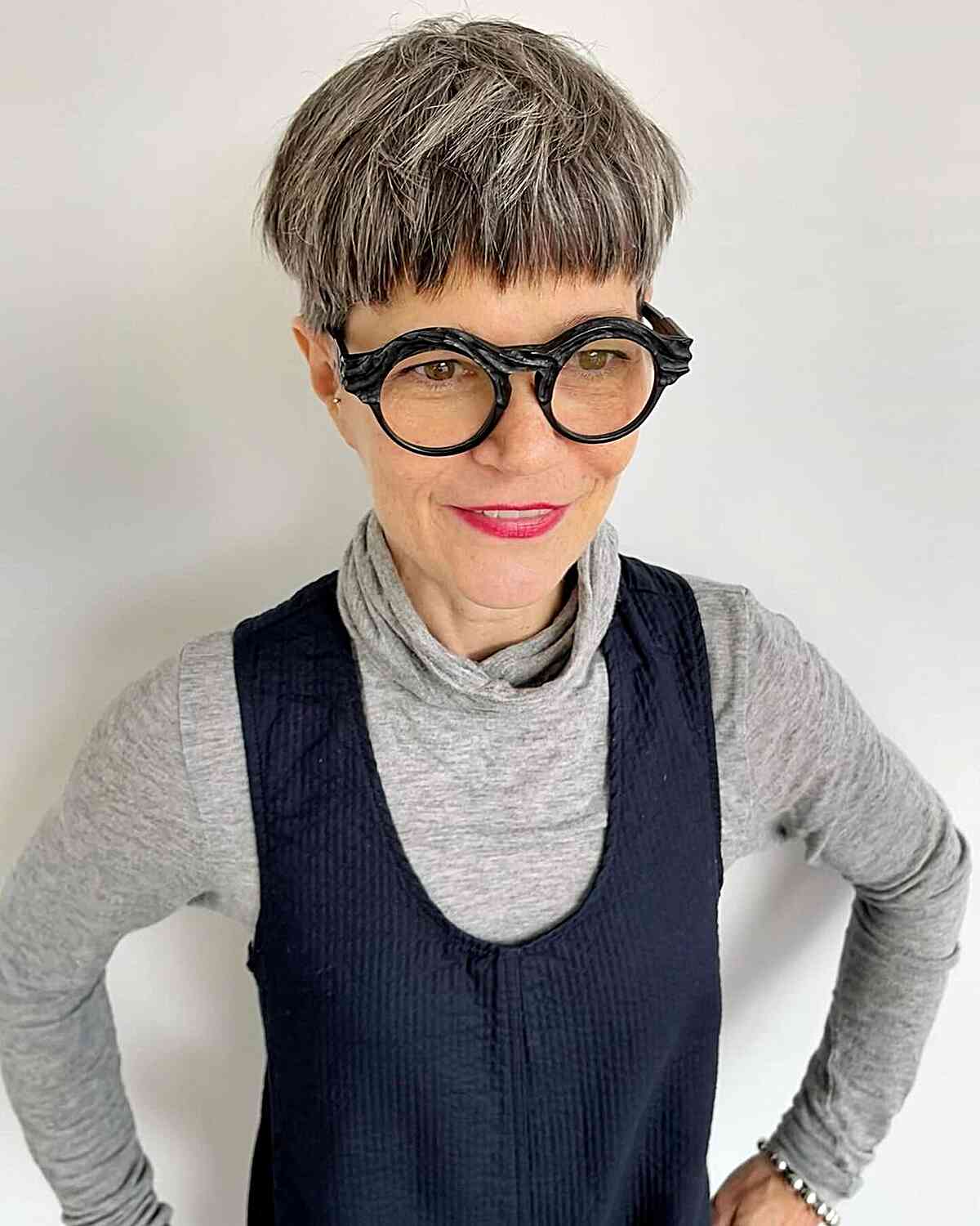 Short gray bowl cut with bangs for 60 year old women with thicker locks