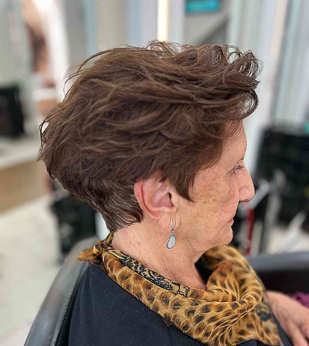 Pixie brunette with messy layers for grannies over 60 with thick hair