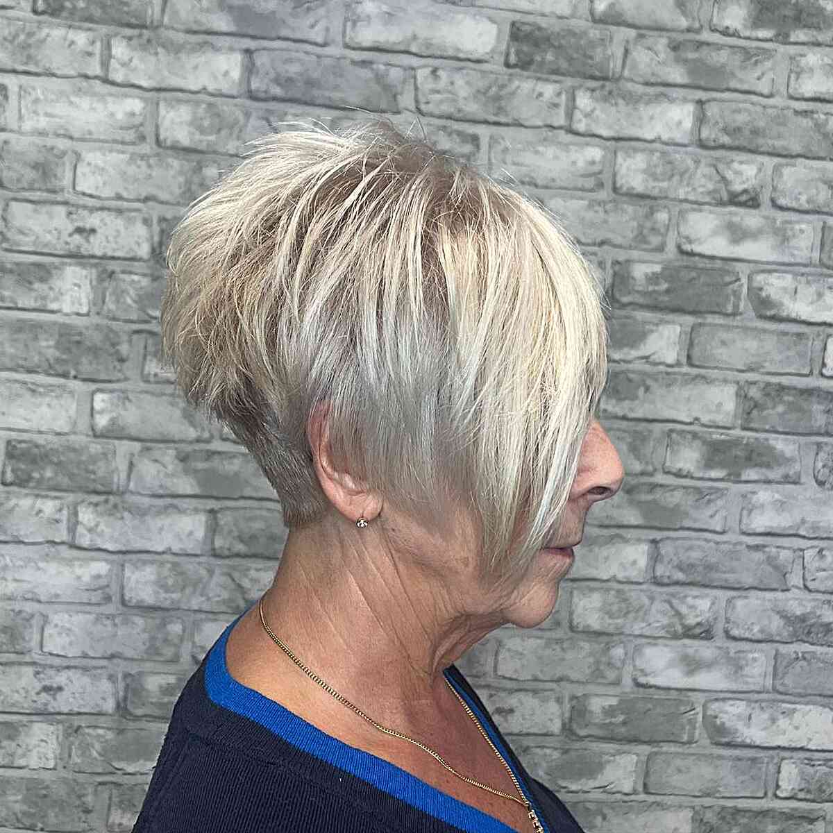 Pixie cut with long fringe for women in their 60s with thick hair