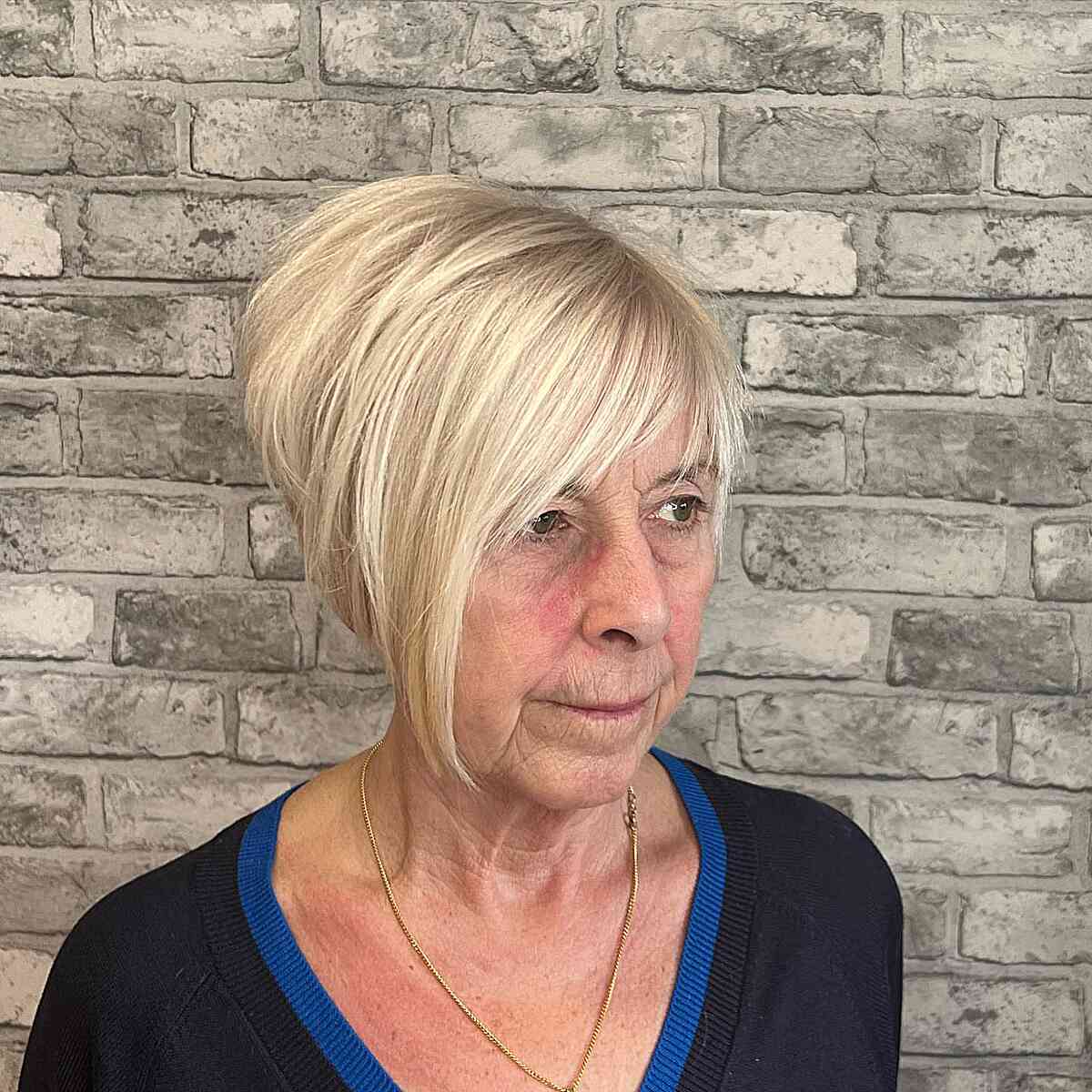 High thick bob with face framing and bangs for 60 year old women