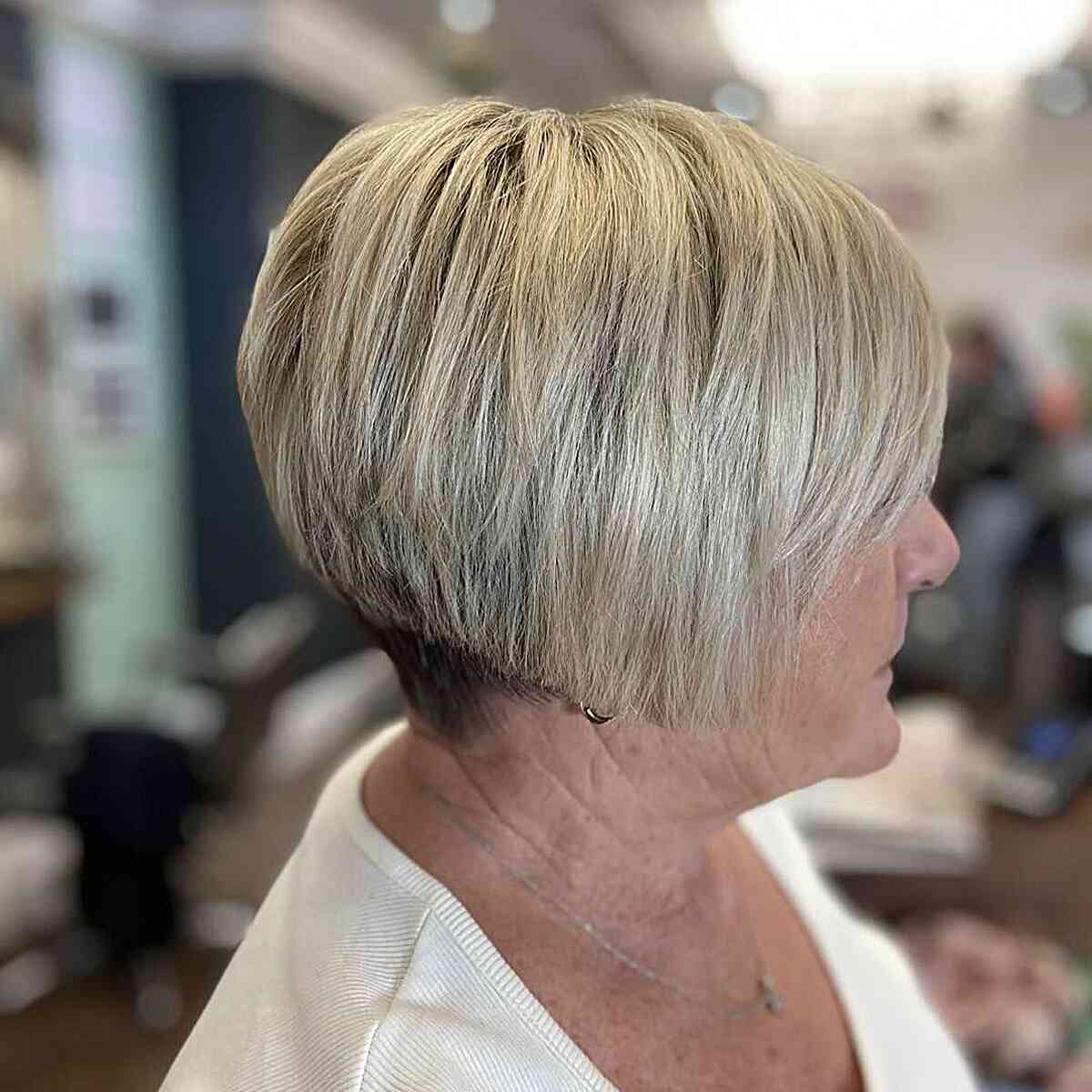 Jaw length bob with undercut for women over 60 with thick hair
