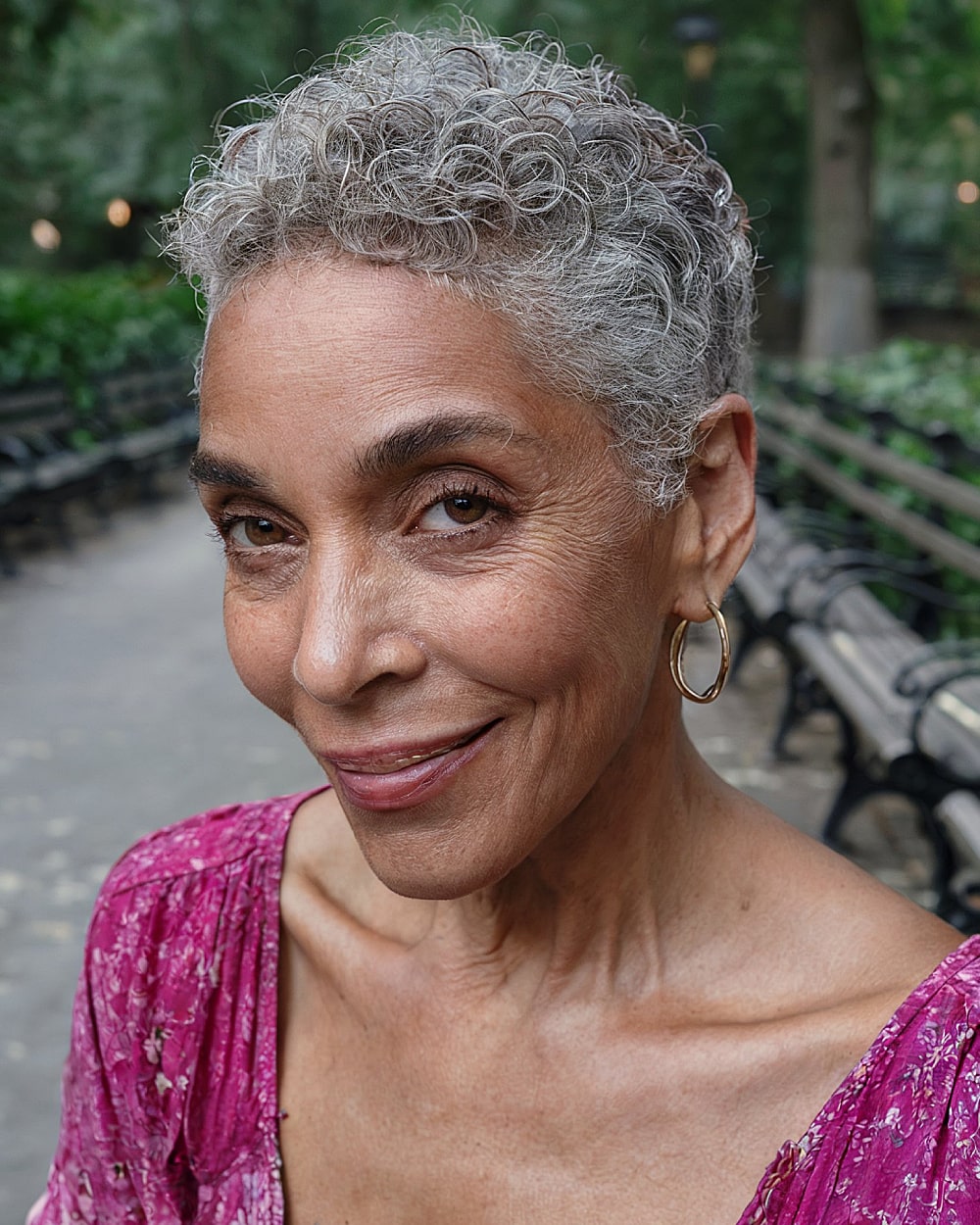 A tightly coiled gray pixie has a natural feel for older black women