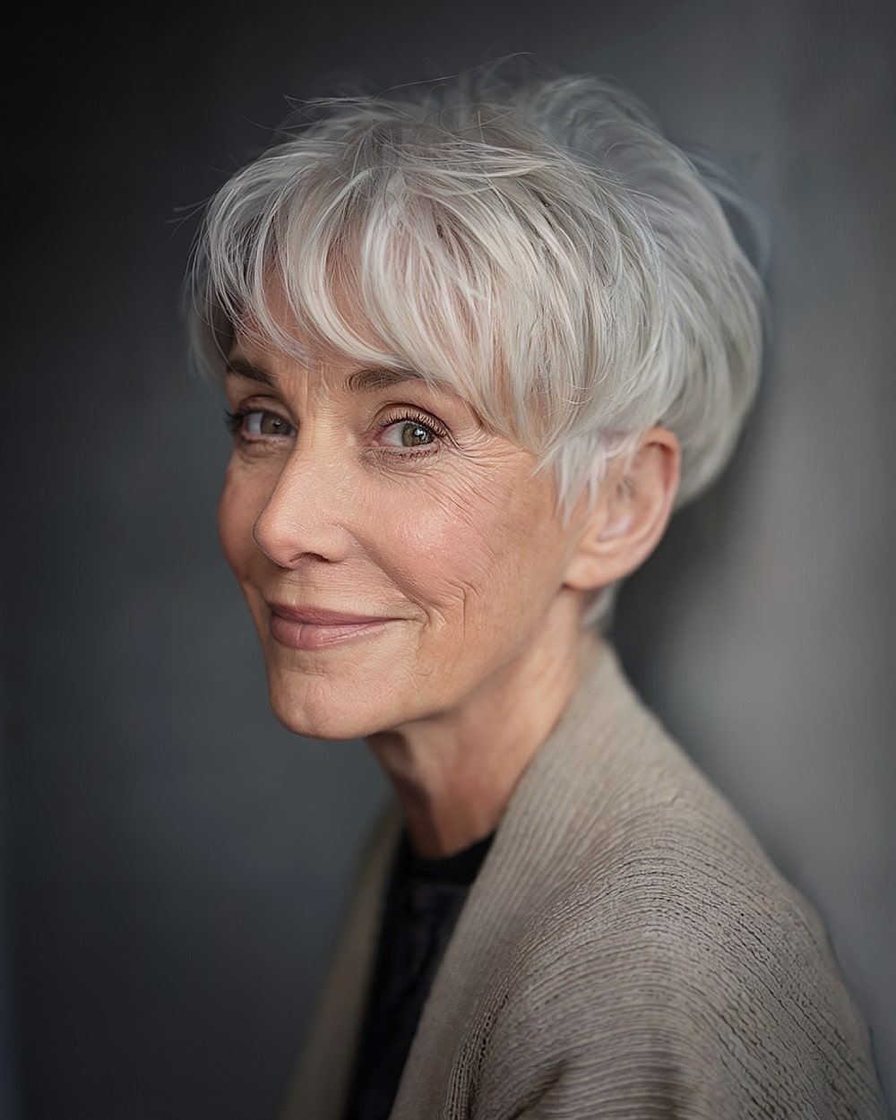 Layered silver gray pixie with textured fringe for chic short hair
