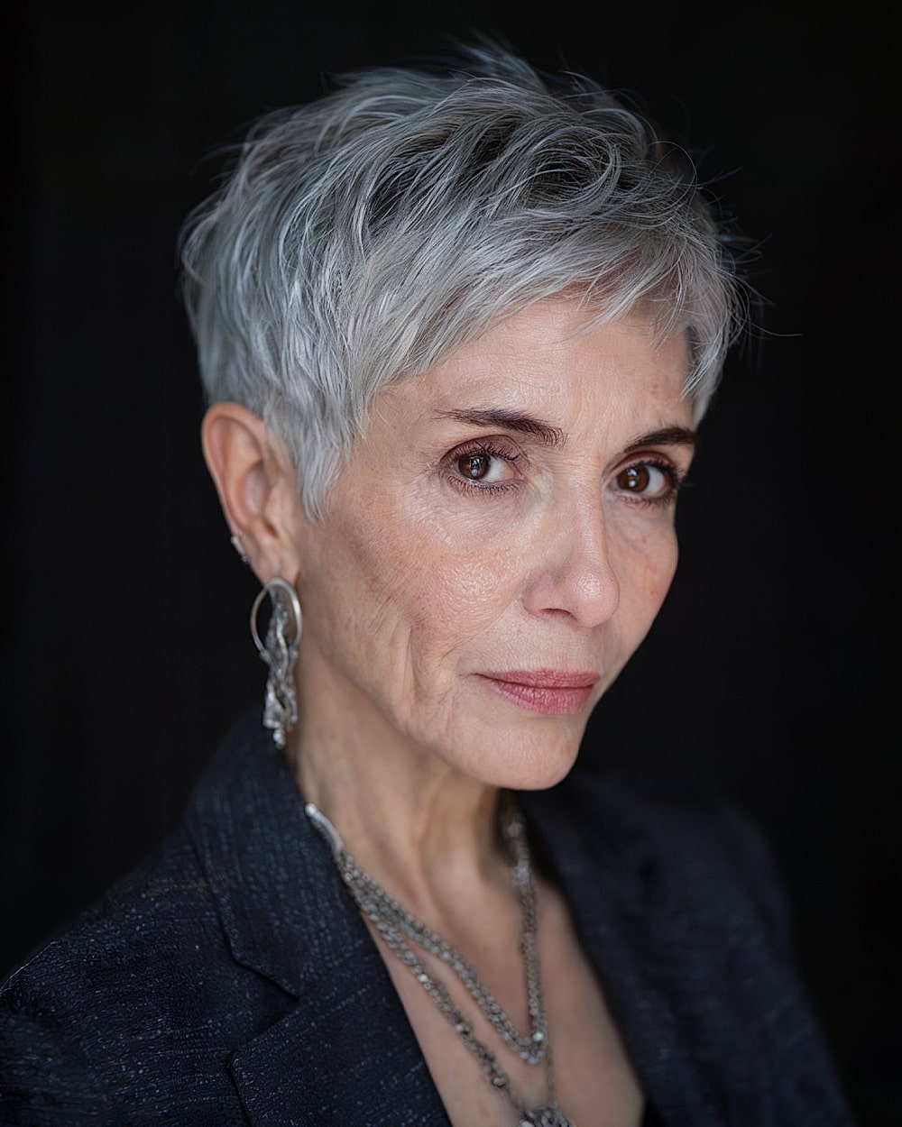Frosty gray pixie cut with soft layers for stylish women over 60