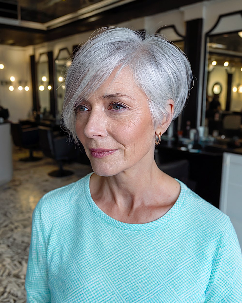 Side pixie for light silver hair over 60 with volume with a layered crown