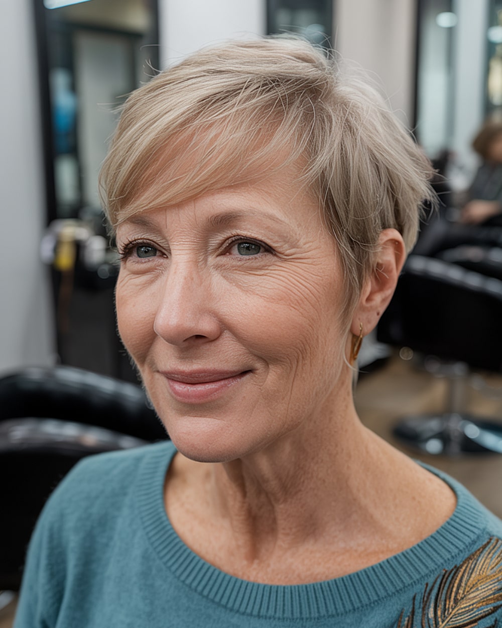Pixie side part for high forehead over 60 with soft blonde hair and diagonal fringe