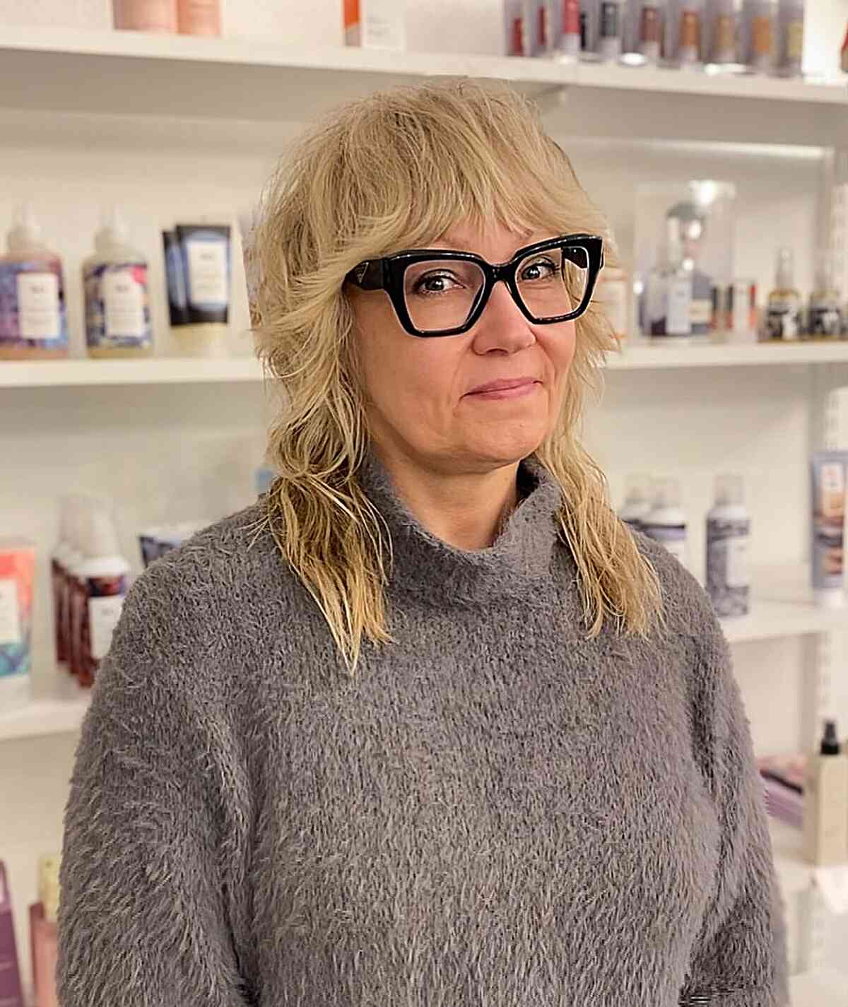 Medium shaggy hair with fringe for women over 60