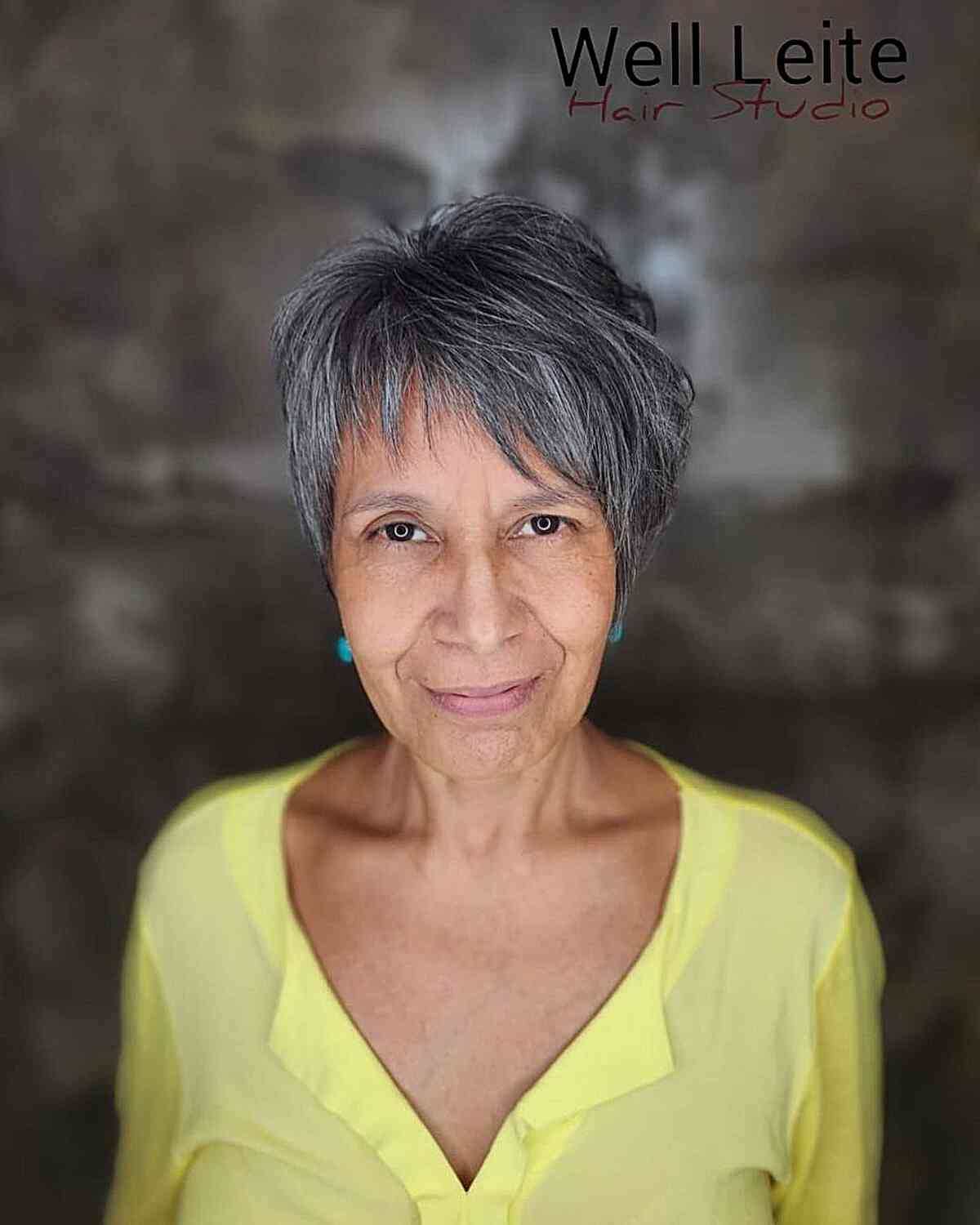 Asymmetrical bangs on the classic pixie cut for women over 60