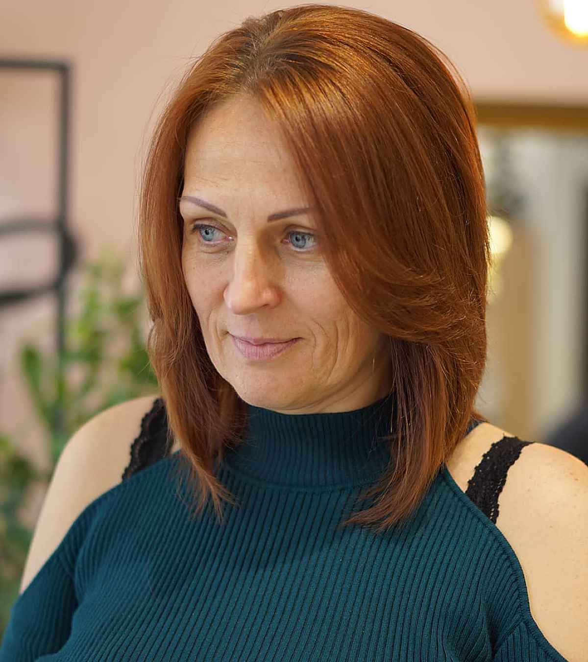 Sleek ginger lob with layers