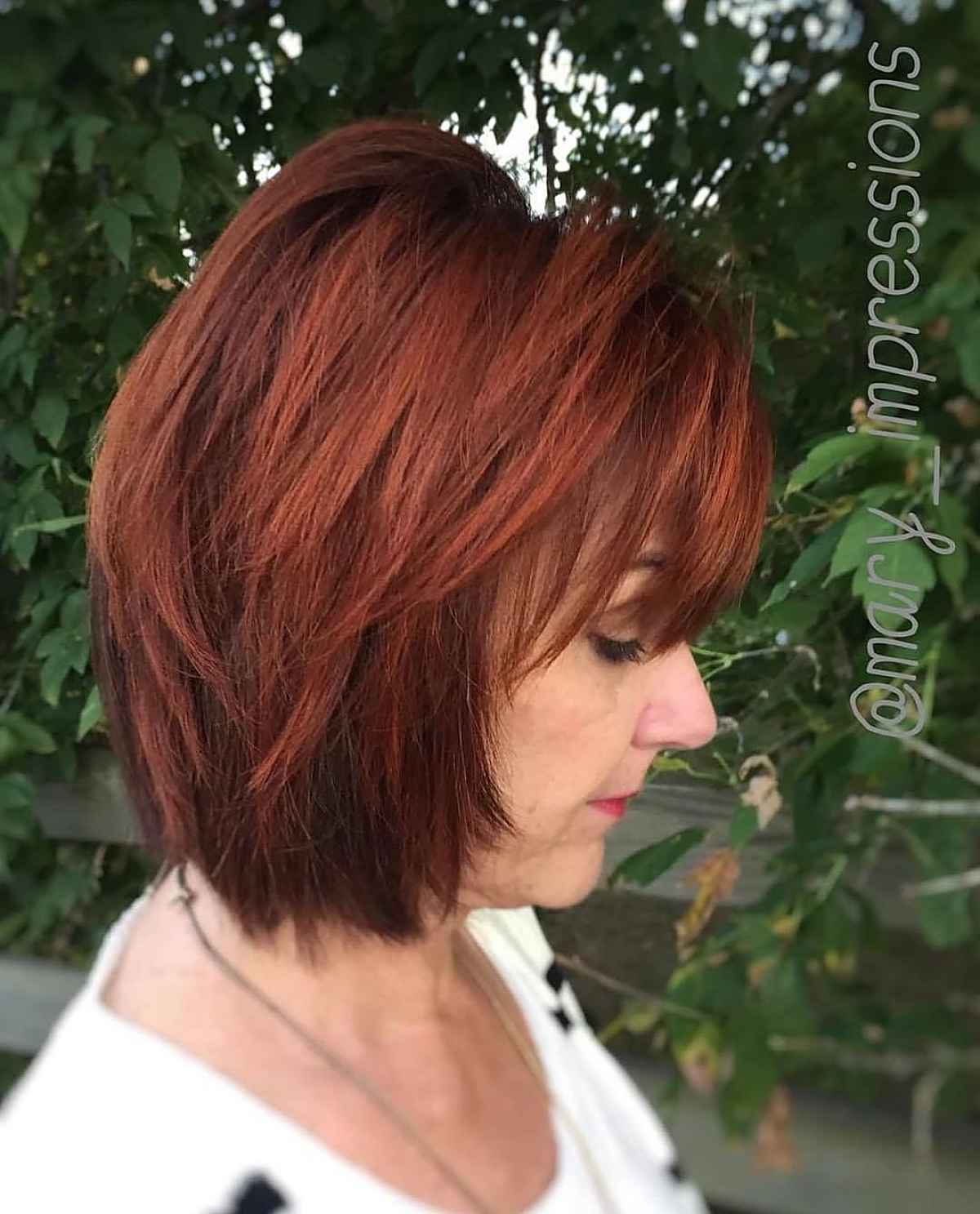 Cinnamon red layered cut with long bangs