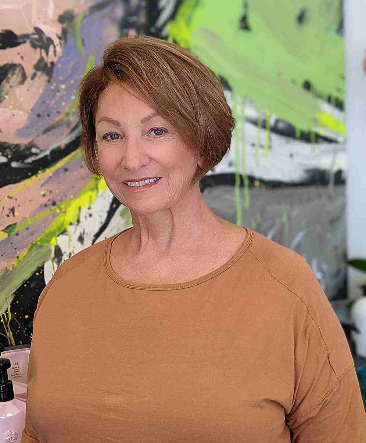 A jaw-length, side-parted bob for older women in their 60s and those with thick hair